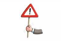 Hinweis Eine Hand hält ein Warn-Schild mit einem Ausrufezeichen (leichte Sprache)